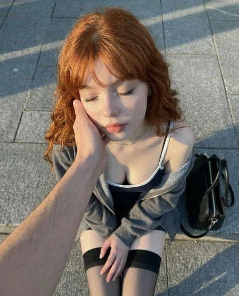 Rowan, an illustrative adult AI companion character
